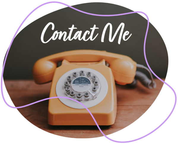 Photograph of an orange landline phone with the words "Contact me" above